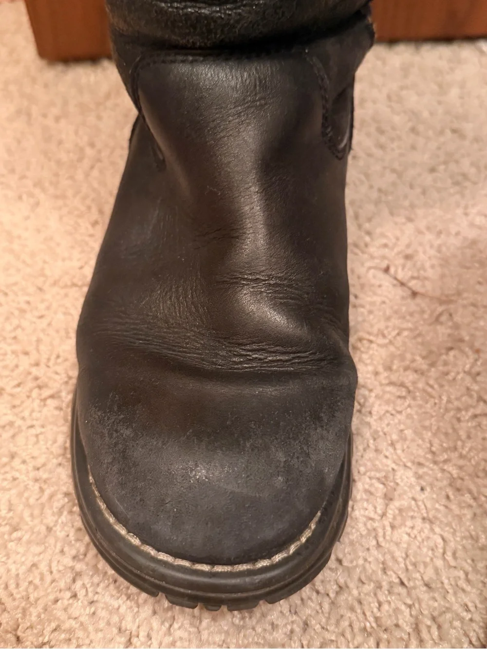 UGG Black Leather Mid-Calf Boots with Tan Shearling Lining